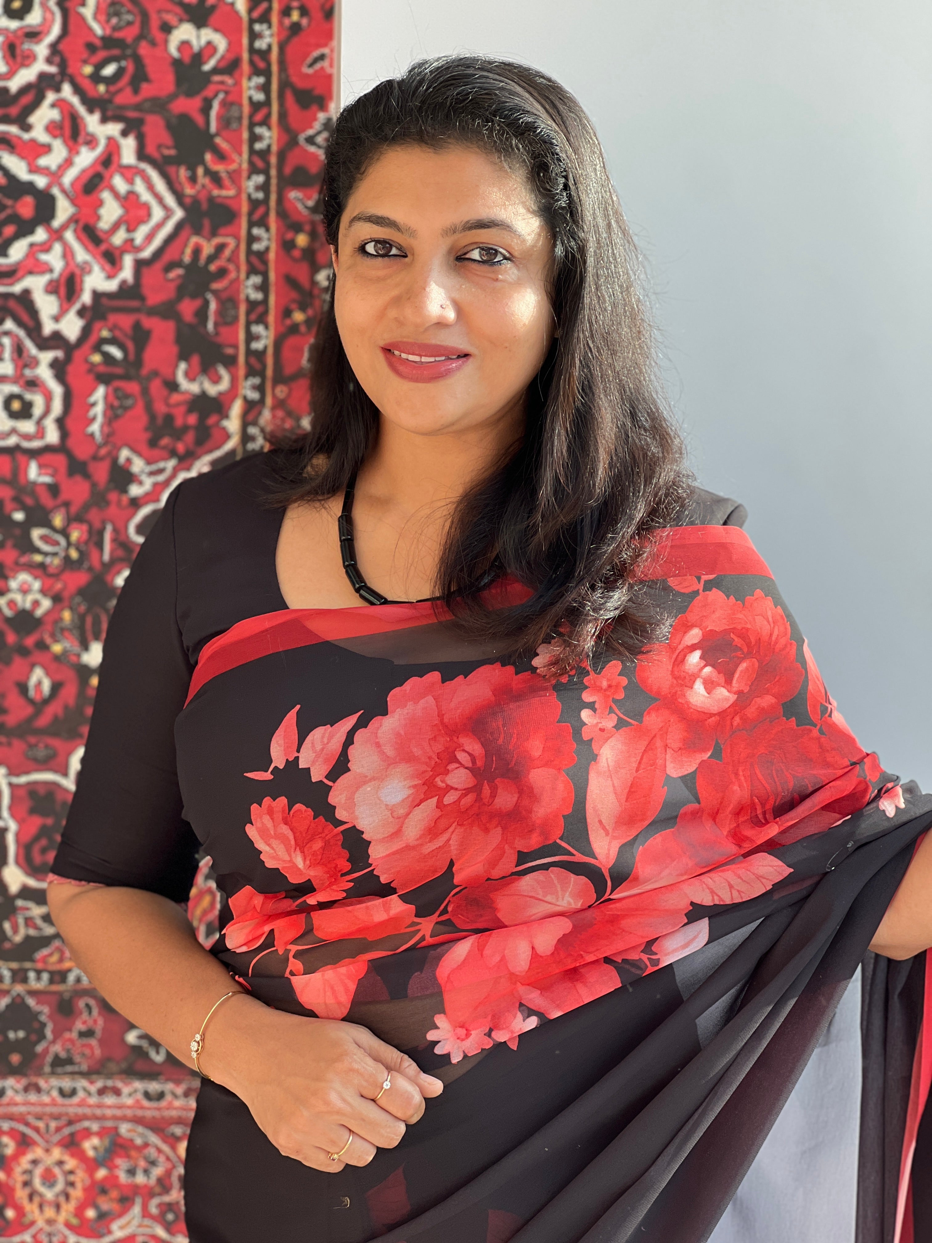 A soft floral georgette saree, light and comfortable for pregnancy