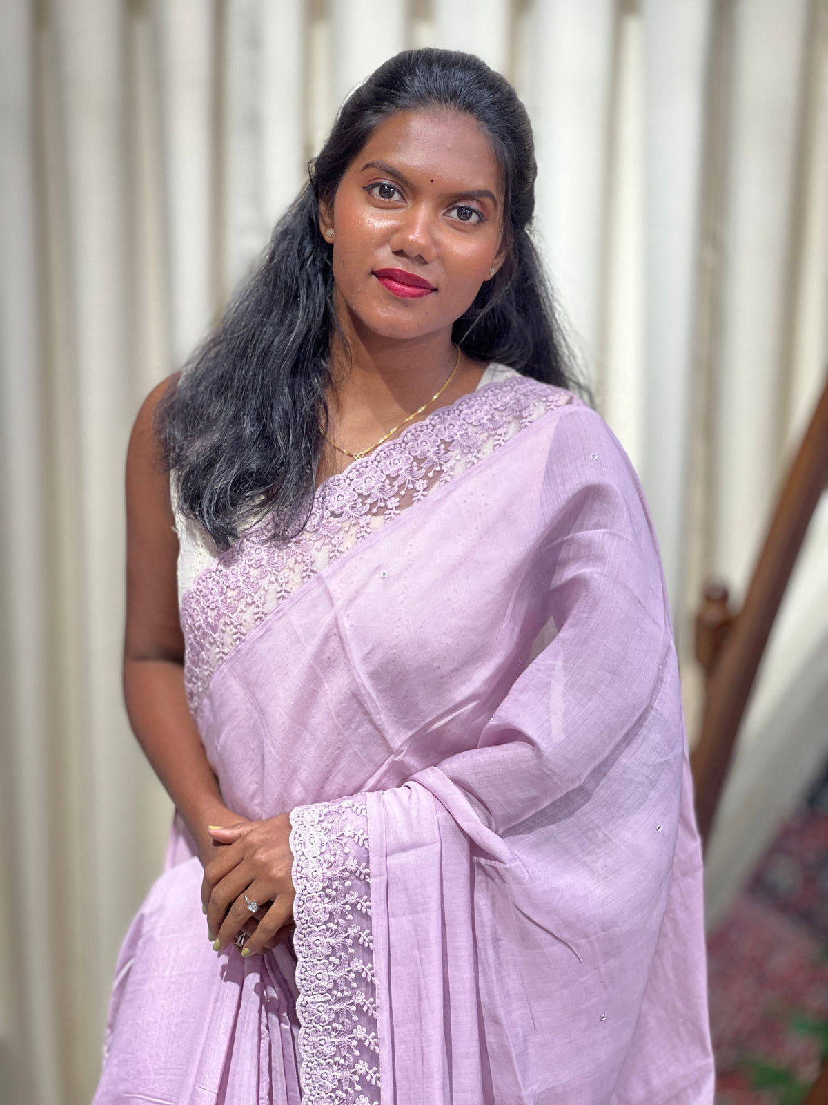A mirror-work viscose organza saree showing the structure and sheen of organza