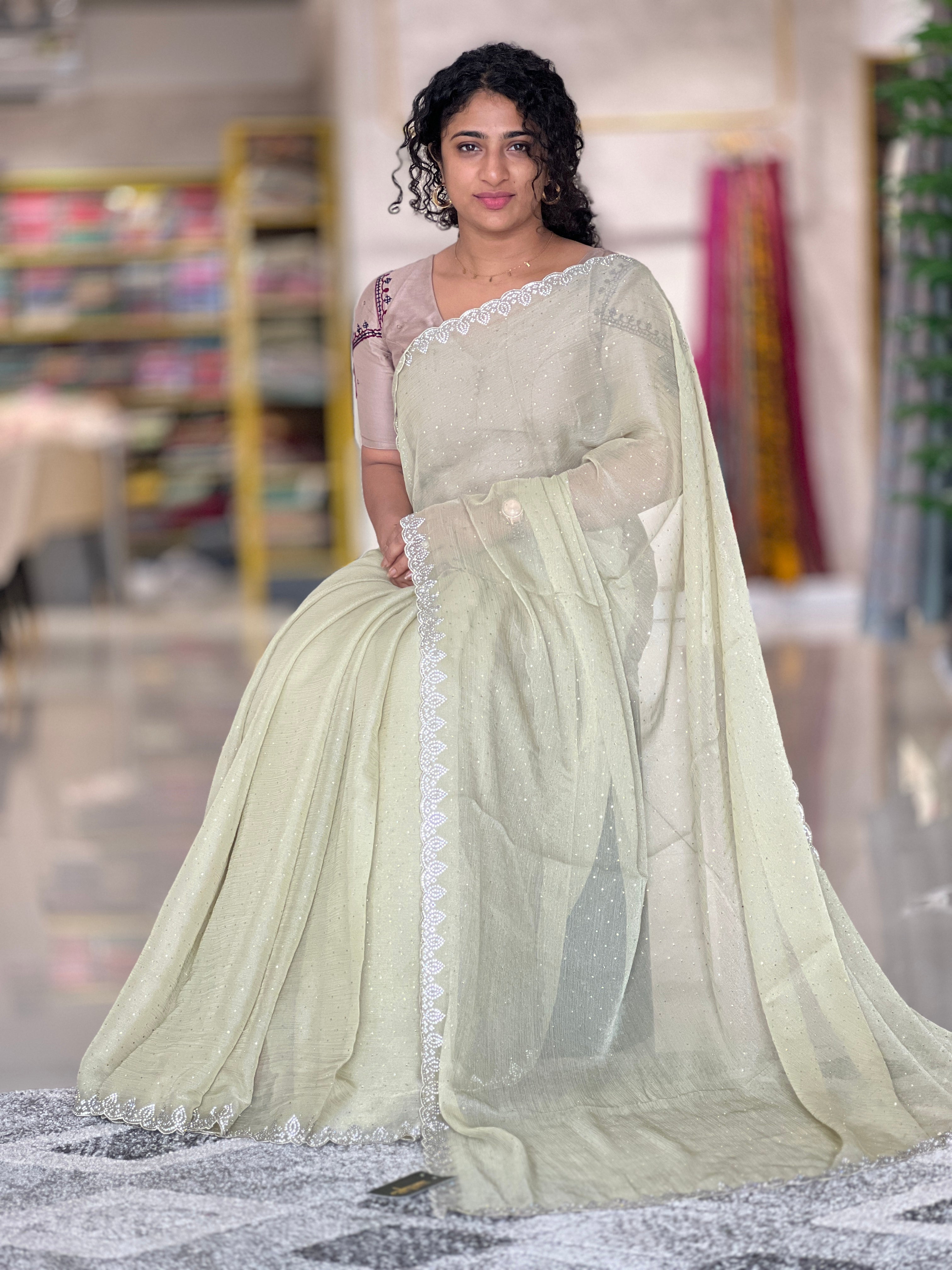 Shimmer crushed organza saree, a delicate sheer fabric that needs careful handling