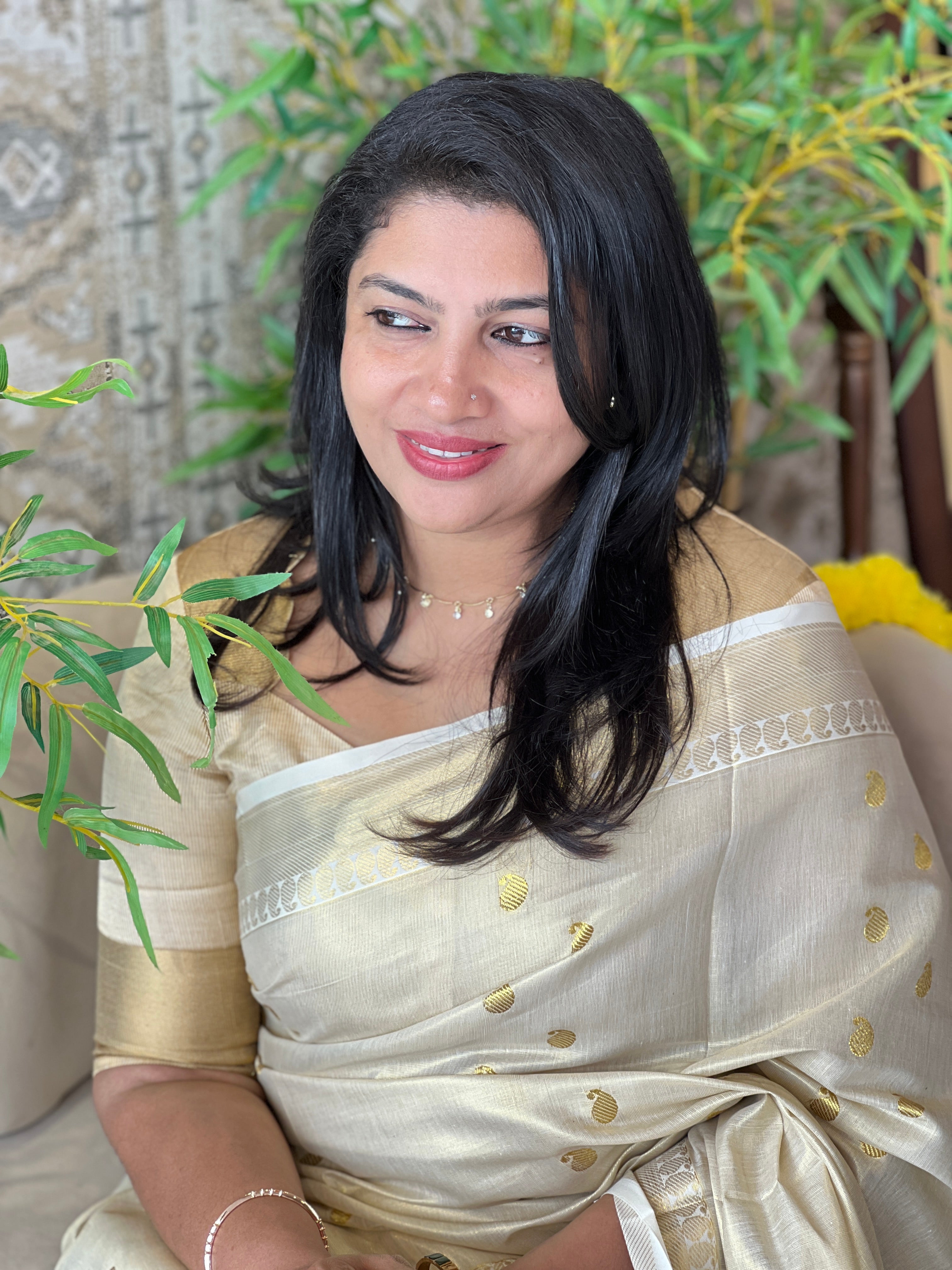 A Kerala tissue saree in cream and gold, a classic and safe gifting choice
