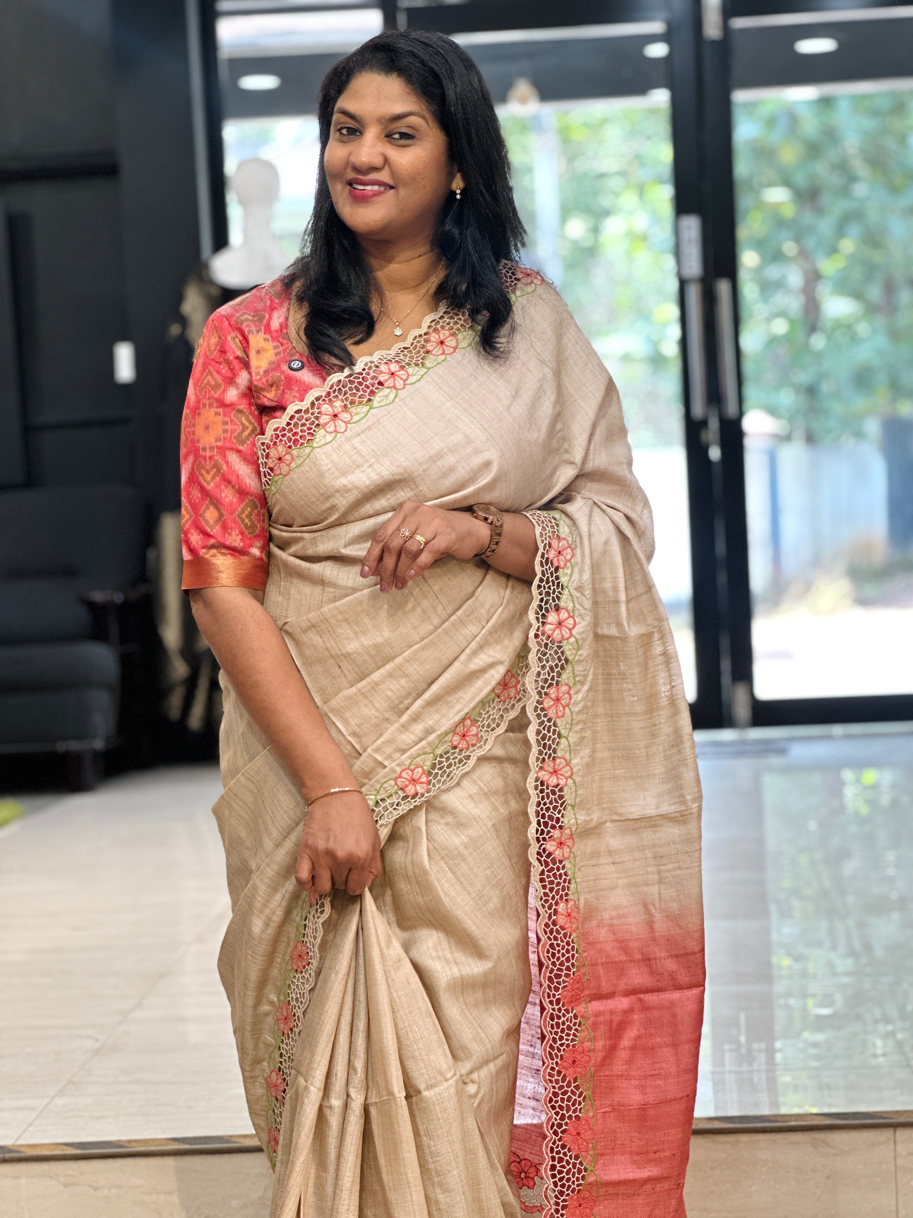 Floral twine cut work desi tussar saree with cutwork embroidery worked over a tussar ground