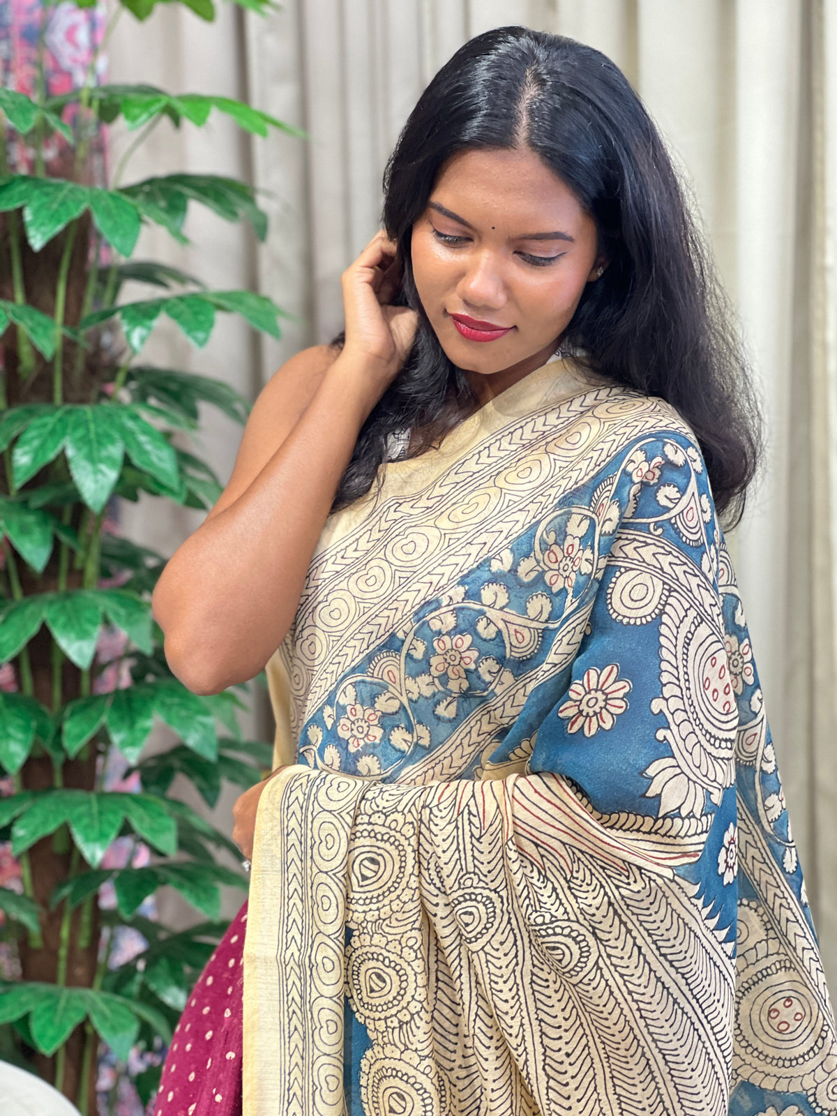 A kalamkari and bandhani patterned saree in festive colours, suited to Navratri