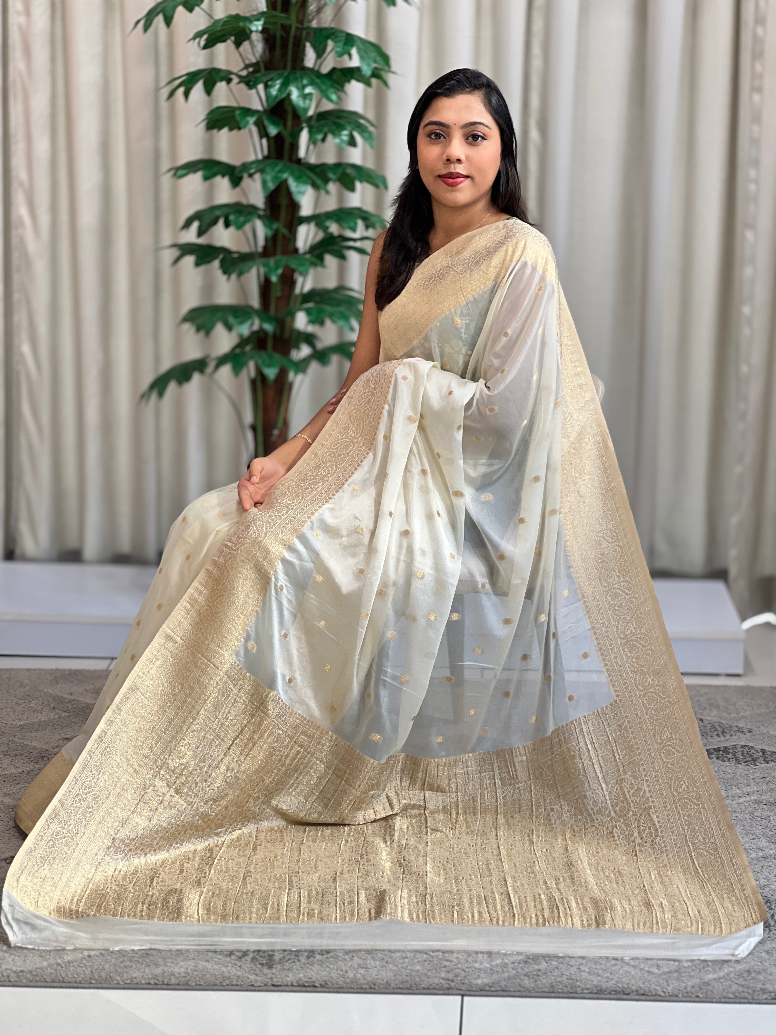Buta woven georgette crepe finish saree with a soft grainy surface and fluid drape