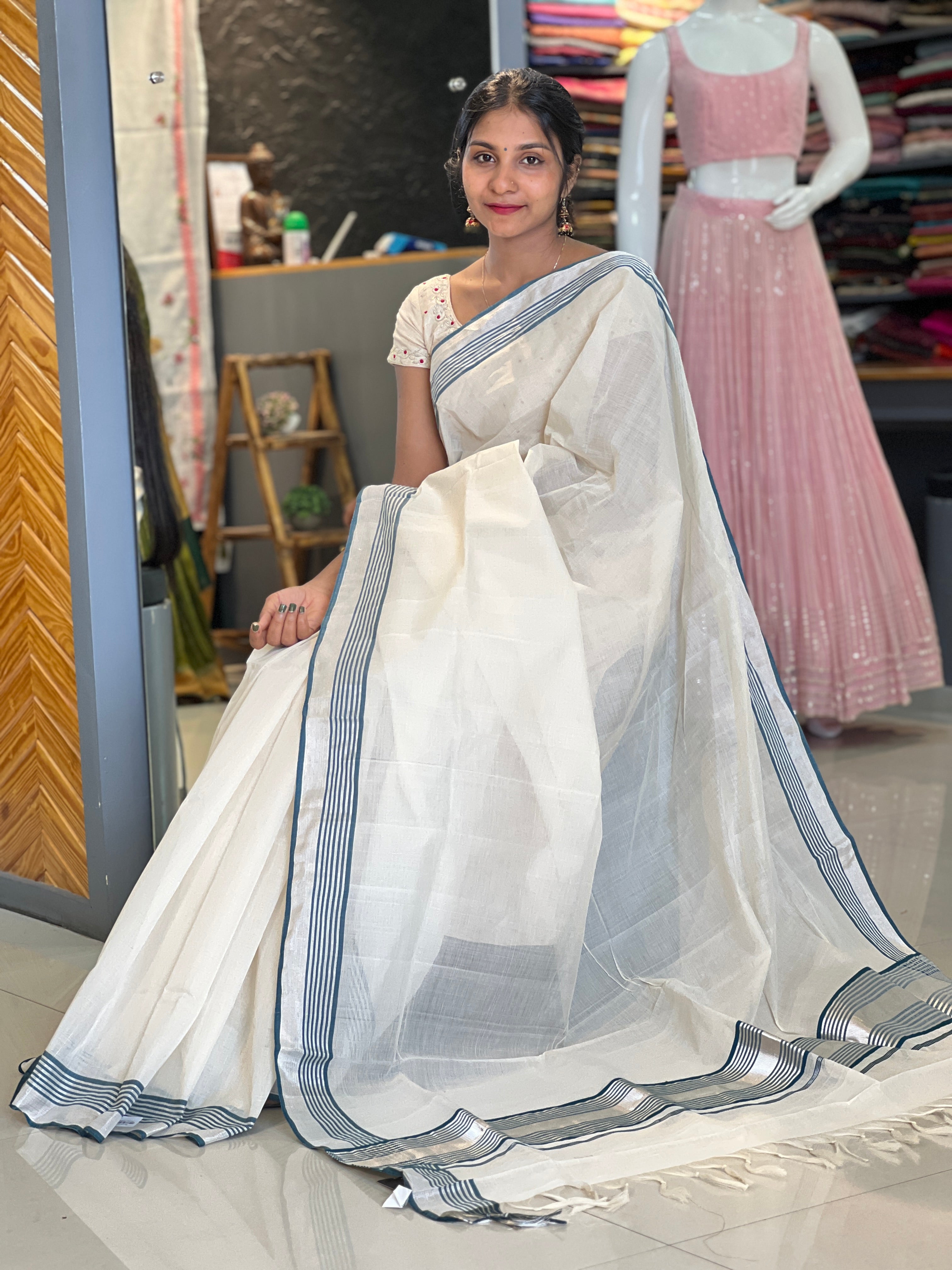 Handloom Chendamangalam Kerala cotton saree in cream with a fine gold border, suitable for Vishu