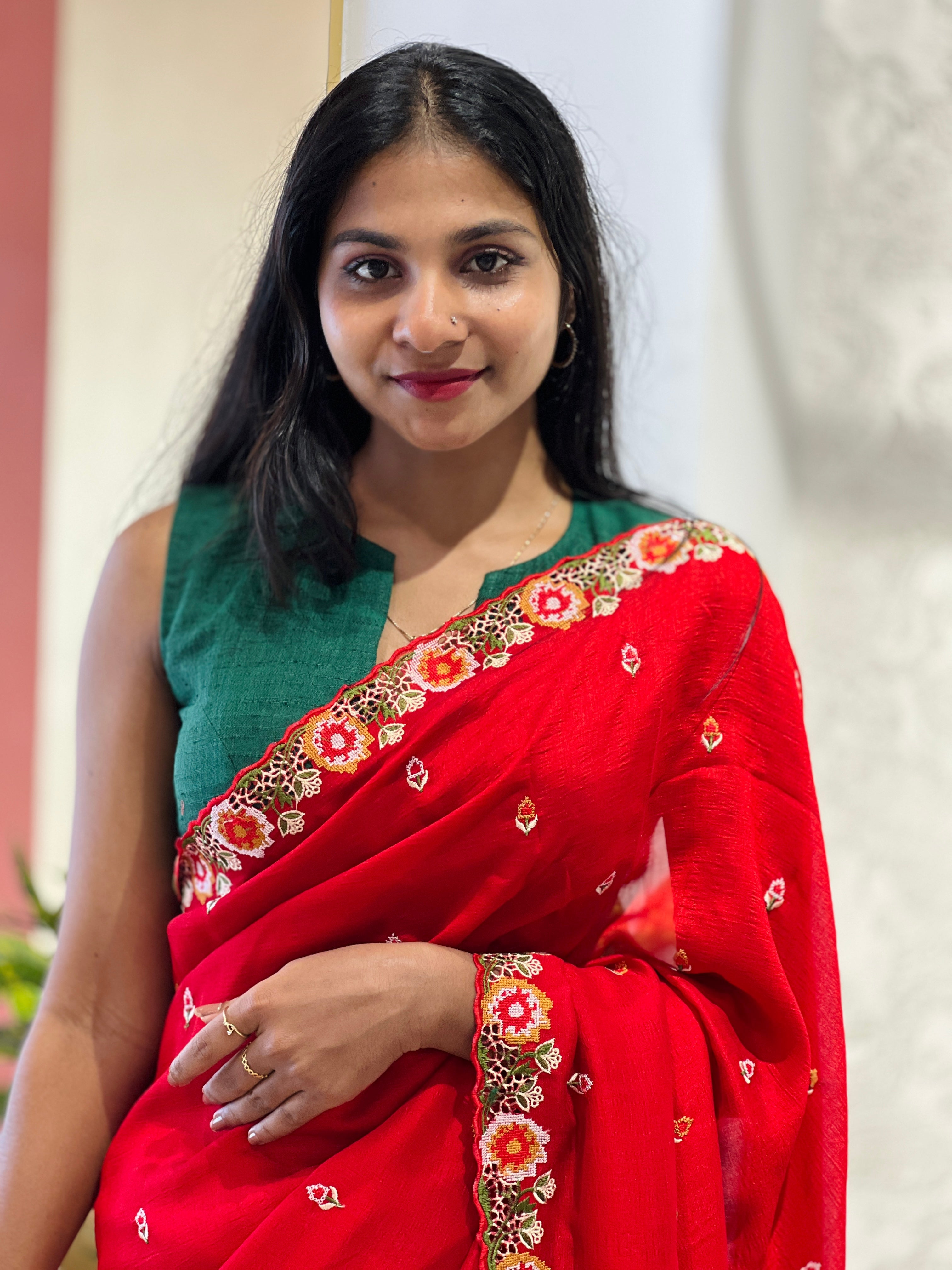 Embroidery border patterned vichitra silk saree with a smooth high-sheen surface