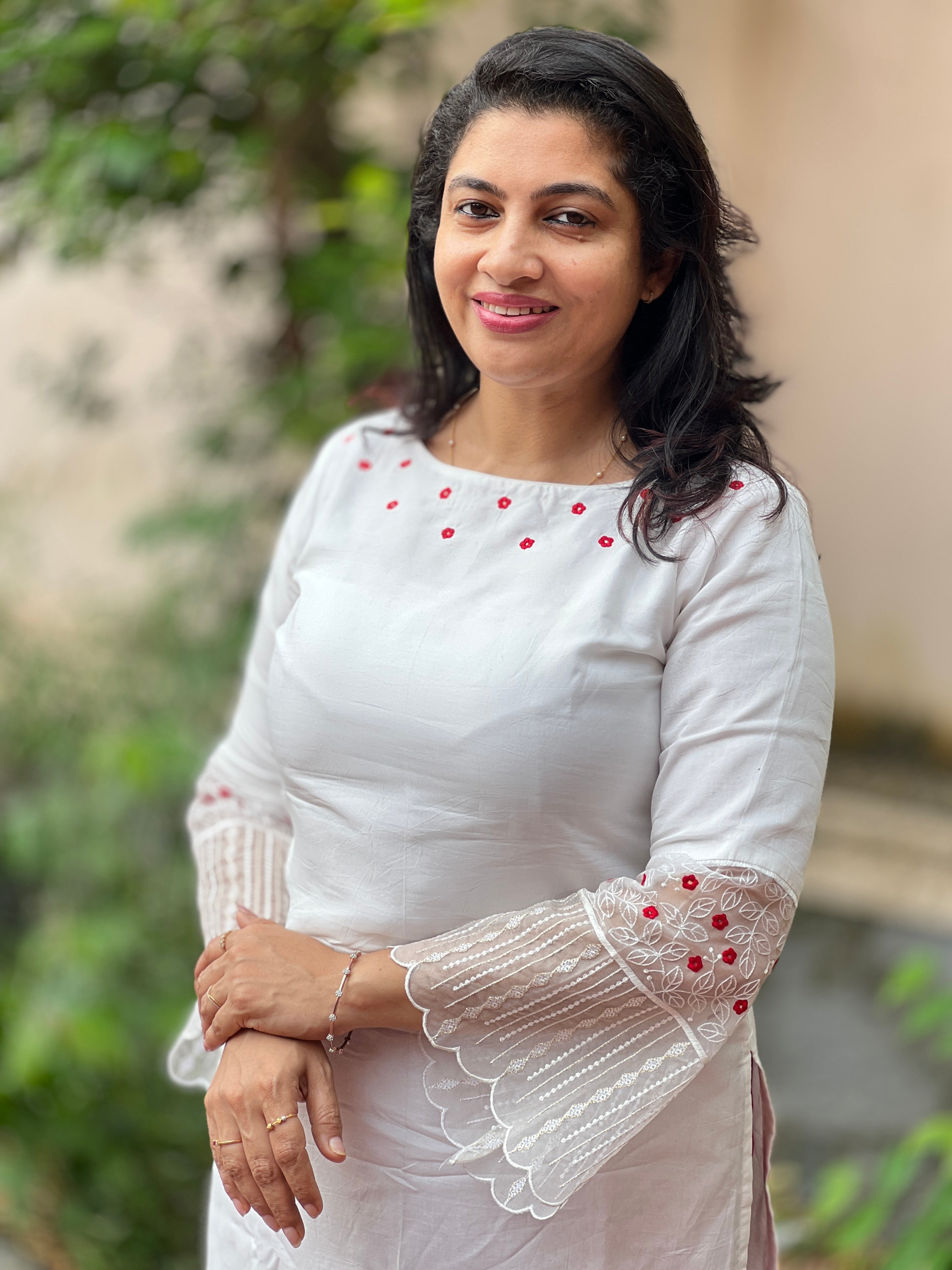 Unstitched white kurta with scattered florals | DN333